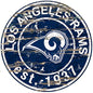 A weathered round LA Rams Football and My Dog sign with blue background and the team mascot emblem, inscribed with "Los Angeles Rams est. 1937".