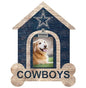 A decorative plaque featuring a happy golden retriever in a frame shaped like a house, with a denim texture and the word "cowboys" at the bottom, adorned with a star at the top.