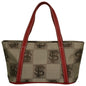 Beige designer tote bag with The Missy 8510 FLORIDA STATE pattern and red leather handles and trim.