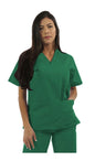 A woman in green medical scrubs stands with her hand on her hip, looking slightly to her right.