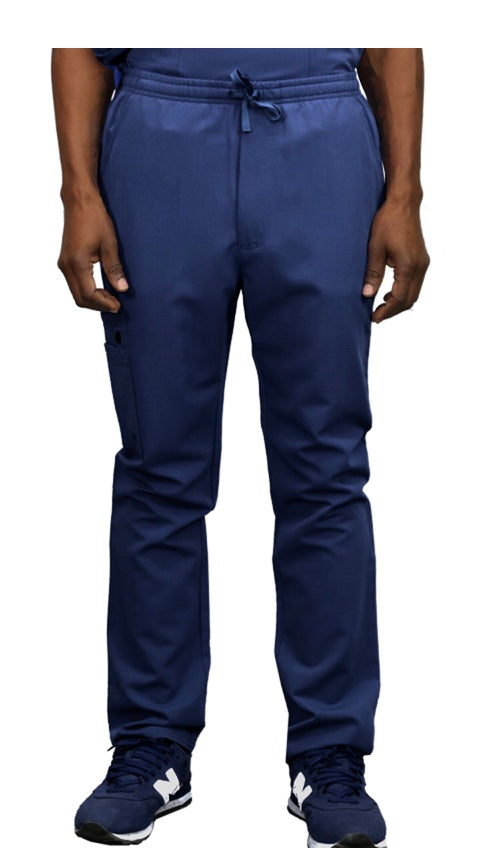 Front view of a person wearing WYND Men's Scrub Pants 830 with a drawstring and navy sneakers, cropped at the waist, visible from torso to feet.