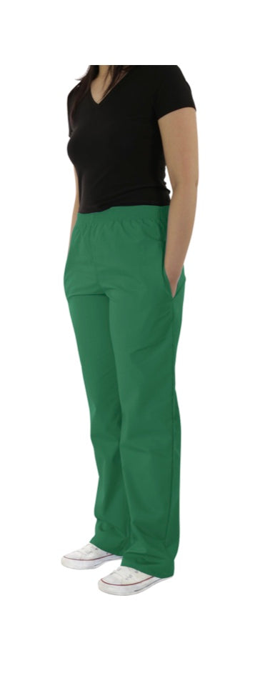 Woman wearing a black short-sleeved top and UltraSoft Unisex Classic Elastic Waist Scrub Pants 300C with white sneakers, standing against a white background.