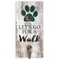 Decorative wall-mounted key holder featuring the phrase "let's go for a walk" and a university of miami logo on a rustic wood background.