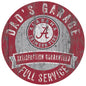 Circular sign with distressed style featuring the text "dad's garage," an alabama crimson tide logo, and the phrases "satisfaction guaranteed" and "full service.