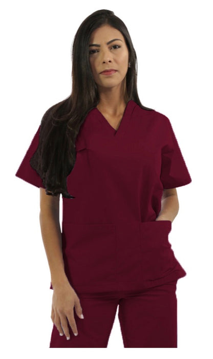 A woman with long dark hair wearing a maroon scrub suit, standing against a plain background.