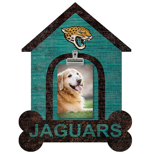 Decorative house-shaped sign featuring "Jacksonville Jaguars" text, a golden retriever photo in the center, and a leopard head emblem on top.