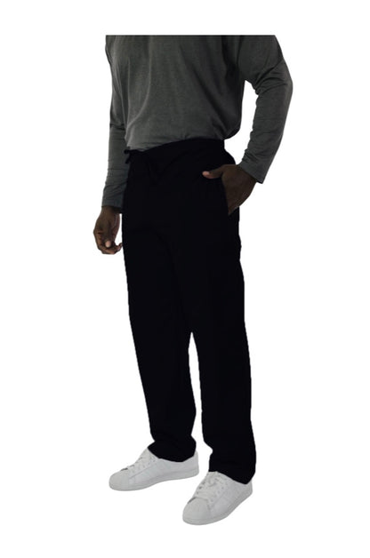 Man wearing a gray long-sleeve shirt and UltraSoft Unisex Cargo 6-Pocket Pants 313C with white sneakers, standing with one hand in his pocket, isolated on a white background.