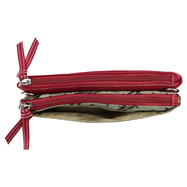 Side view of a red Shane Crossbody Wristlet 8182 ALABAMA with multiple compartments, isolated on a white background.