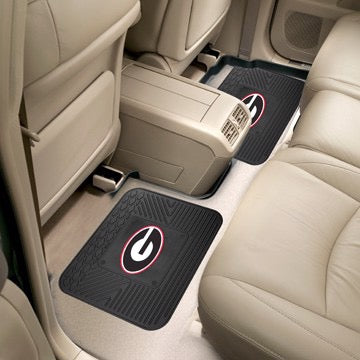 Car interior showing two Georgia Bulldogs 4-PC Vinyl Car Mats with a circular red logo on the rear passenger side.