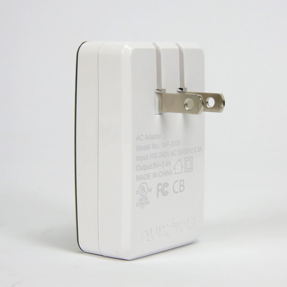 QuikVolt Florida Gators WP-200X Classic Dual-Port USB Wall Charger with folding plug pins and specification labels, isolated on a white background.