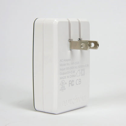 QuikVolt Florida Gators WP-200X Classic Dual-Port USB Wall Charger with folding plug pins and specification labels, isolated on a white background.