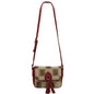A small crossbody bag featuring a Vintage 8597 FLORIDA STATE dollar sign print, adorned with red accents and a tassel, displayed against a white background.