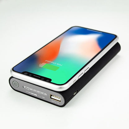 Florida Gators 8000WX Wireless Mobile Charger - Qi Certified lying on a portable battery charger with a charging cable connected, displaying a colorful screen with the time 9:41.