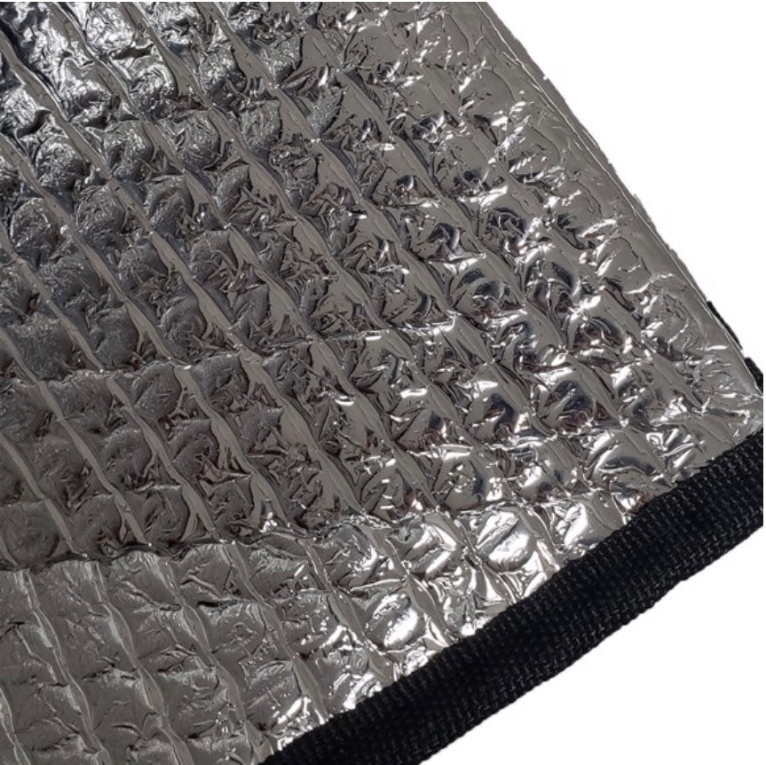 Close-up of a Miami Hurricanes Auto Shade with a textured surface and black border.