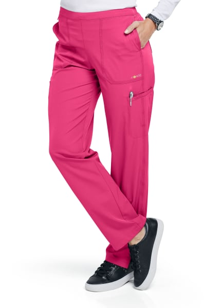Woman wearing FLAT FRONT STRAIGHT LEG PANT C52106 cargo pants standing with one hand on her hip, showcasing the side cargo pocket detail.