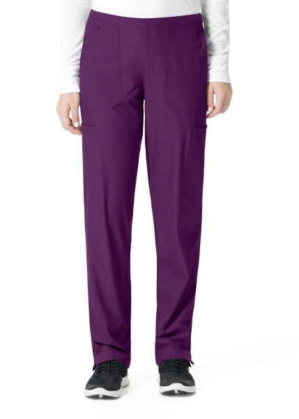 A person wearing FLAT FRONT STRAIGHT LEG PANT C52106 with cargo pockets, paired with black sneakers.