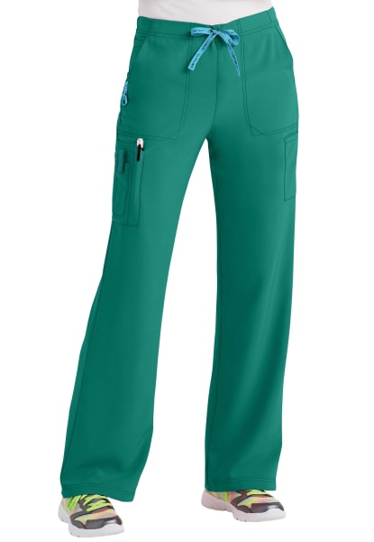 A pair of CROSS FLEX UTILITY BOOT CUT SCRUB PANT C52110 with multiple pockets and a drawstring waist, displayed on a mannequin.
