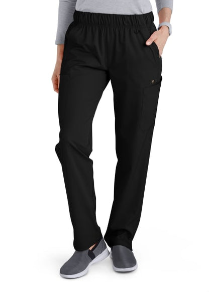 Woman standing in Comfort Waist Utility Cargo Pants with a side pocket, paired with grey slip-on shoes.