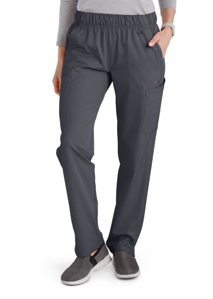 Woman wearing gray Comfort Waist Utility Cargo Pants (Women's C53106) with a side pocket, paired with dark gray slip-on shoes.
