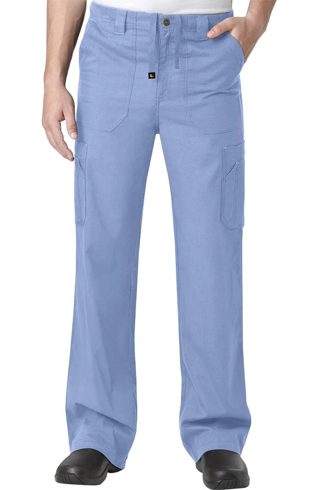 A person wearing light blue cargo pants with black shoes, standing with one hand slightly in a pocket.