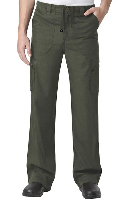 Man wearing olive green cargo pants with pockets, standing with hands partially inserted in front pockets.