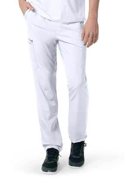 A person wearing white medical scrubs and black shoes, shown from the waist down, with a focus on the Carhartt C55106 - Men's Athletic Cargo Pant.