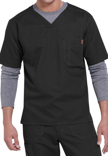 A man wearing a SOLID RIPSTOP SCRUB UTILITY TOP (Men's C15108) with a gray undershirt, featuring a chest pocket and visible stitching.