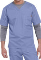 A man wearing a SOLID RIPSTOP SCRUB UTILITY TOP (Men's C15108) with a chest pocket and grey long-sleeve undershirt.