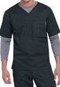 A man wearing a SOLID RIPSTOP SCRUB UTILITY TOP (Men's C15108) with a v-neck and layered gray long-sleeve shirt underneath, featuring visible stitching details and a pocket on the chest.